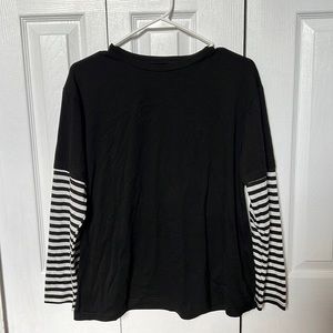 New black and white stripped, long sleeve shirt.